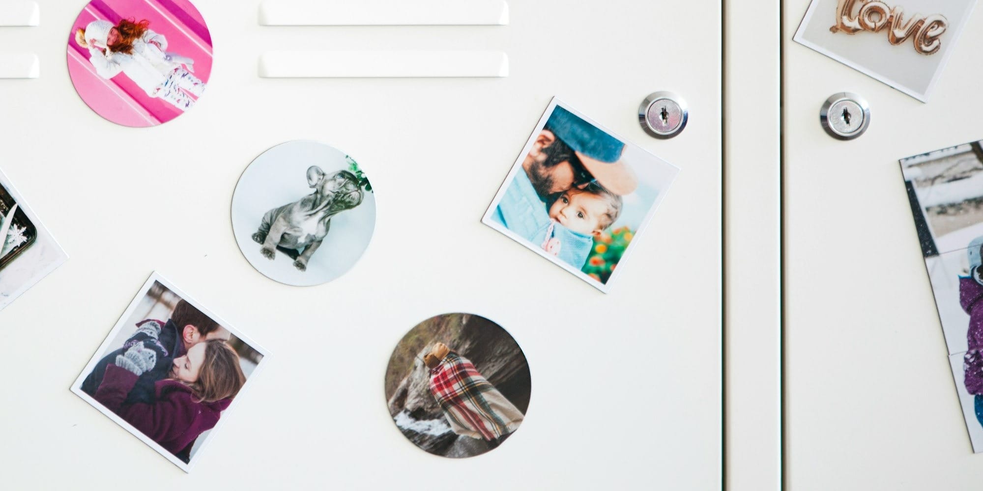 a white refrigerator with magnets and pictures on it